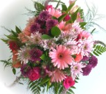Deliver a mixed bunch of flowers in shades of pink in gift wrap - Click to enlarge